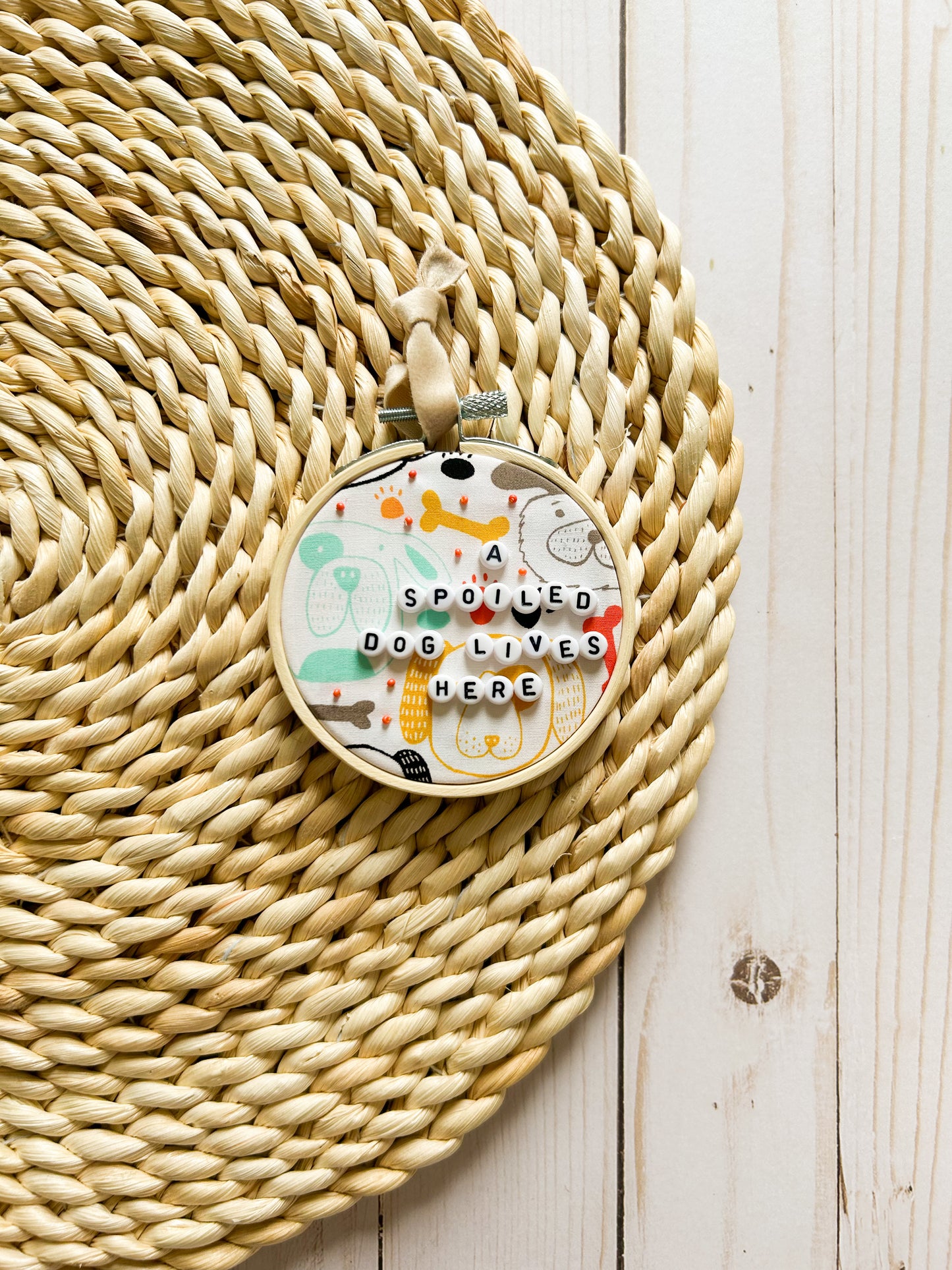 A Spoiled Dog Lives Here Hoop Ornament