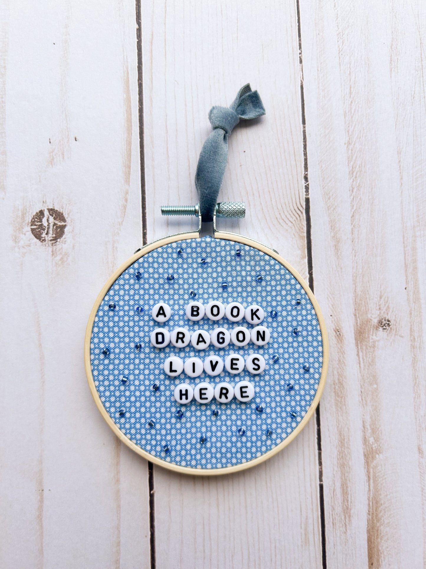 A Book Dragon Hoop Ornament