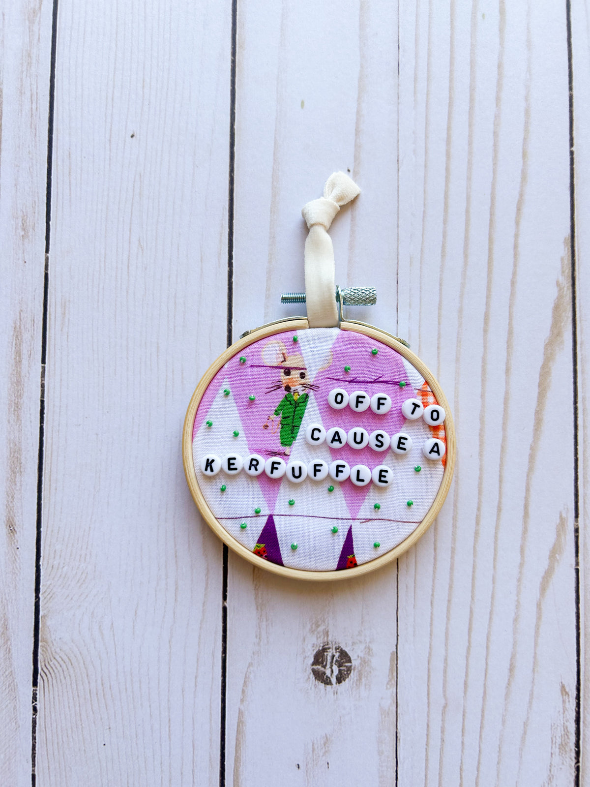 Off to Cause a Kerfluffle Hoop Ornament