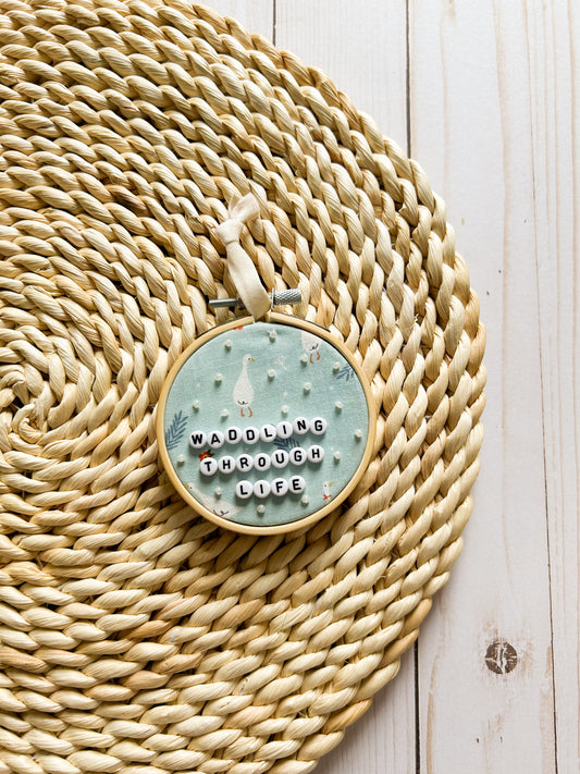 Waddling Through Life Hoop Ornament