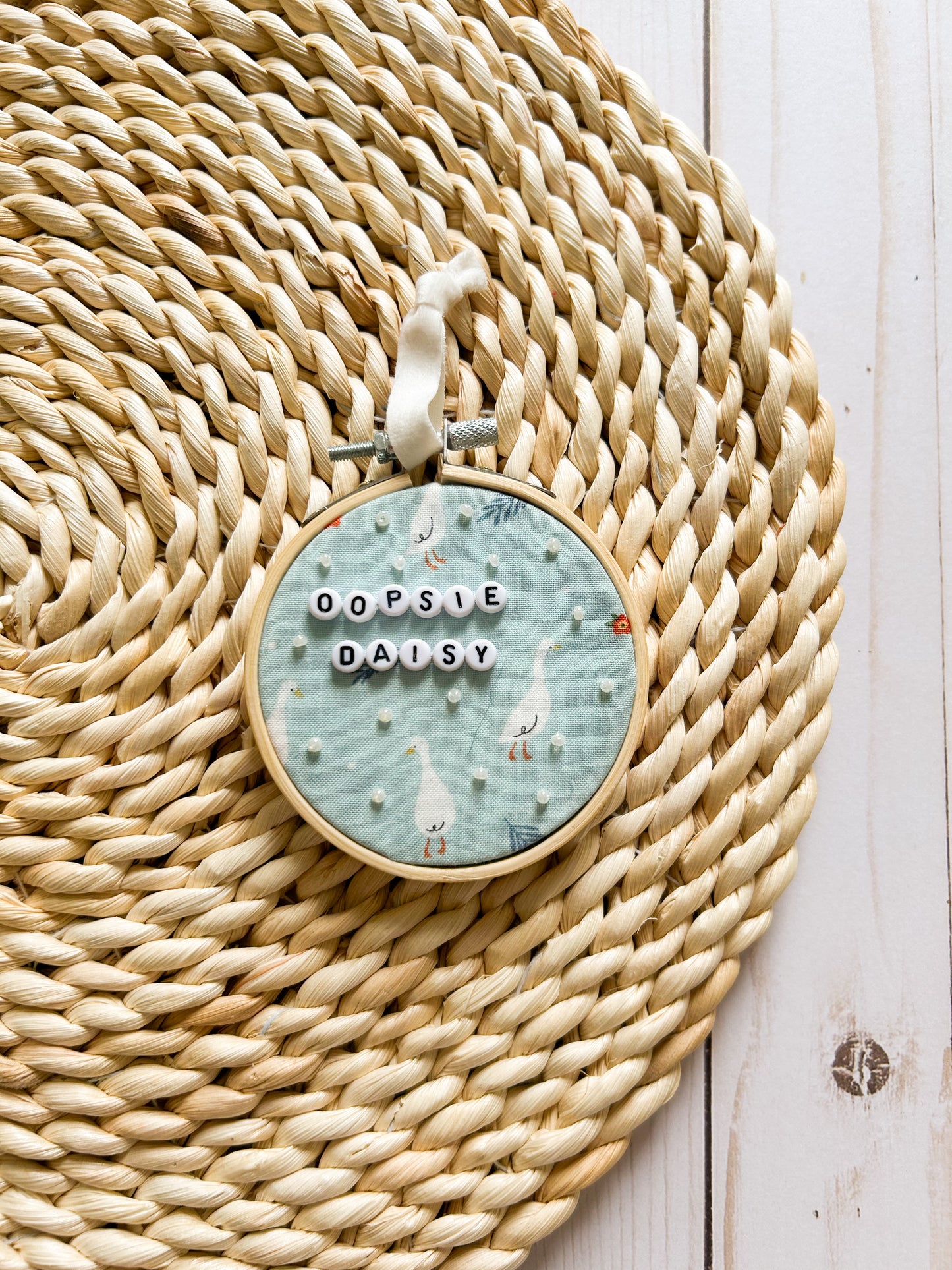Oopsie Daisy Hoop Ornament